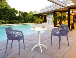 2 Grey Air XL Chairs and White Octopus Table Set in the Garden by the Pool