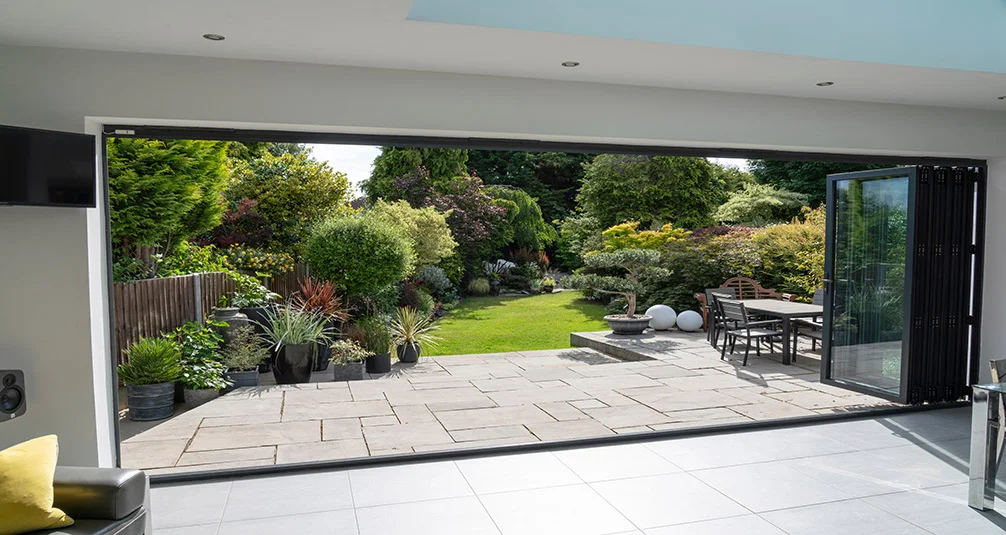Sliding windows opened to show large back garden
