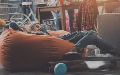 Girl lazing on a beanbag